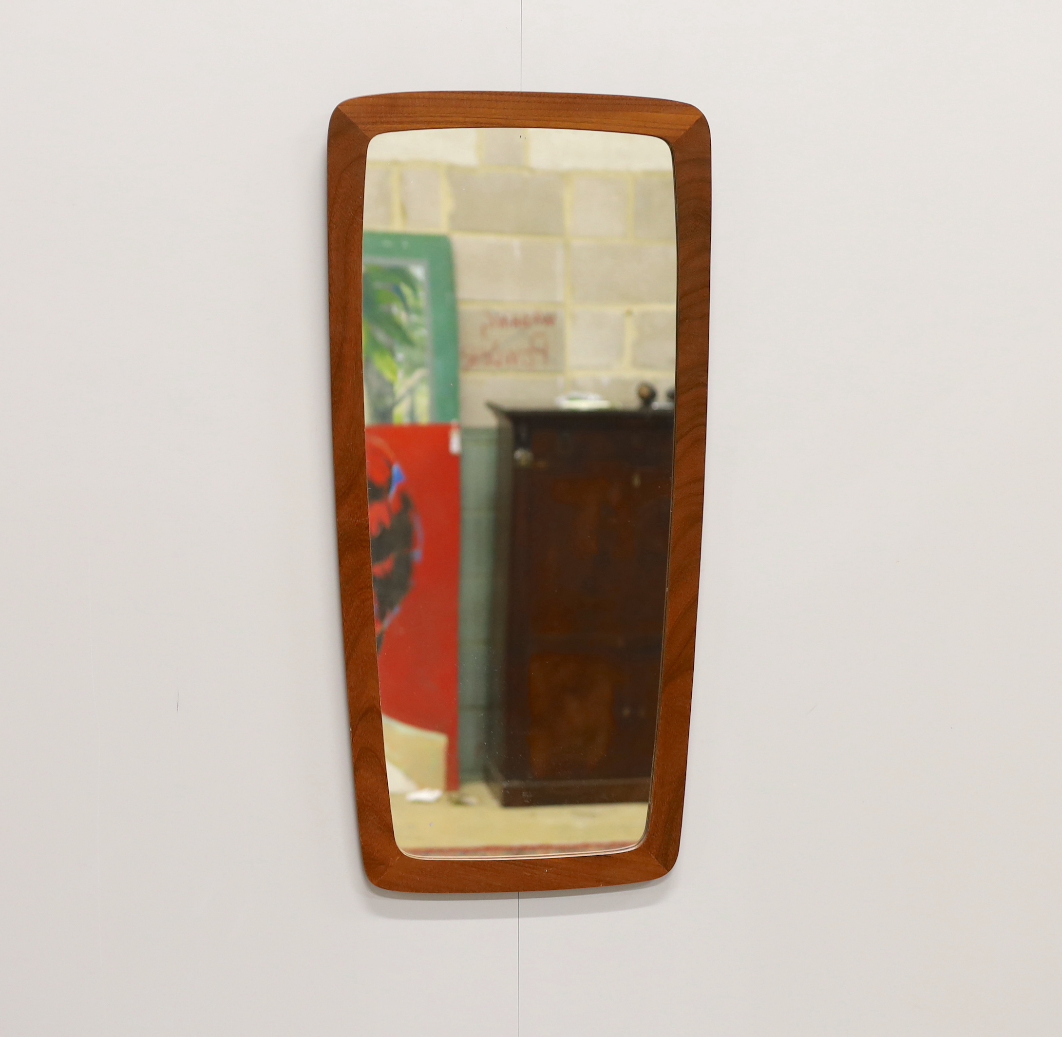 A mid-century teak framed wall mirror, width 36cm, height 76cm